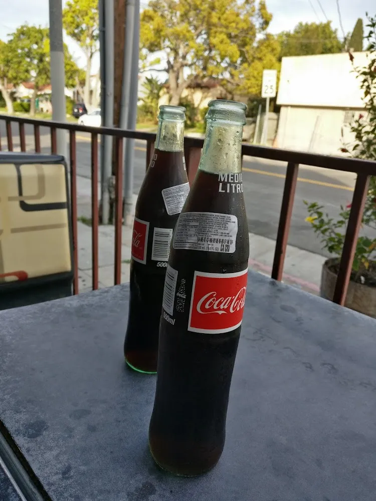 Coke Bottle Medio Litro